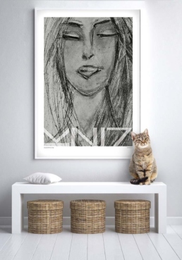 Picture of a cat and a white bench in front of a framed art poster portraying a woman with eyes closed