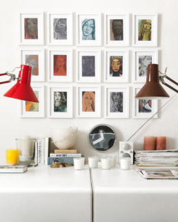 A collection of framed art postcards as a gallery wall