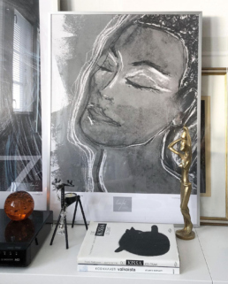 Art poster of a woman with her eyes closed